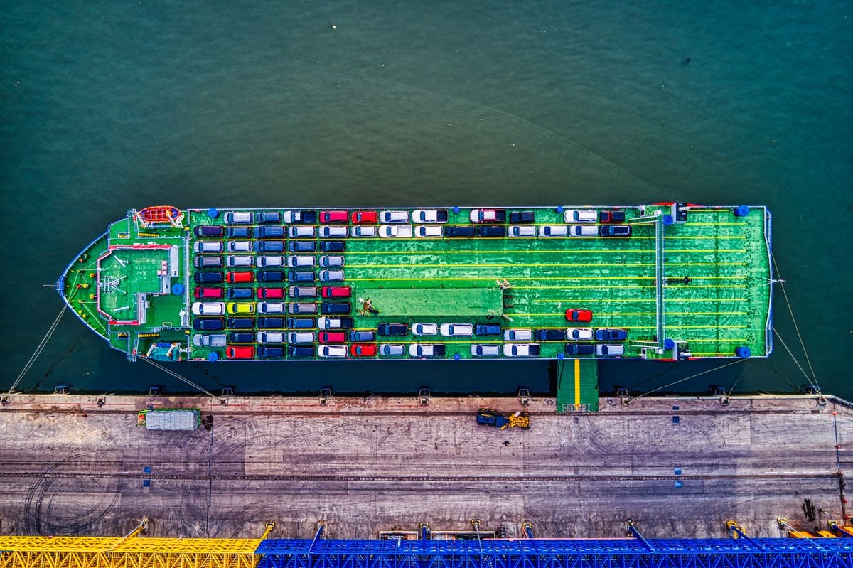 Aerial view of a car carrier ship loaded with vehicles
